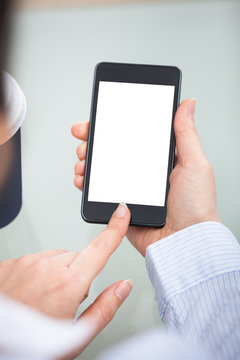 Businessperson Hand On Blank Screen Mobile Phone
