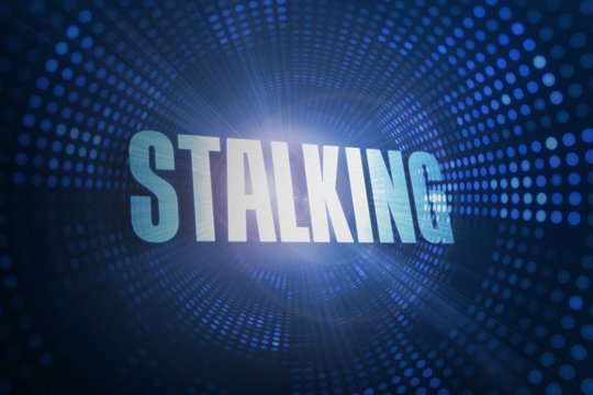 Stalking against futuristic dotted blue and black background