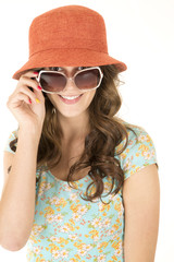 cute female model wearing orange hat and sunglasses
