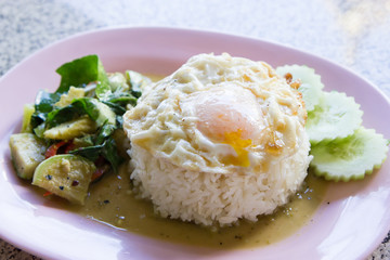Rice with curry and fried egg