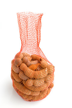 Tamarind in net isolated on white background