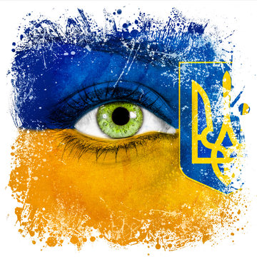 Ukraine flag painted over female face
