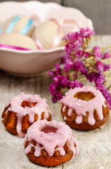 Traditional easter yeast cake decorated with pink icing