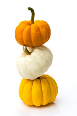 Stacked of pumpkins isolated on white background - 62358600