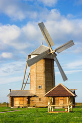 Traditional wooden windmill in russian village