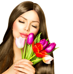 Obraz na płótnie Canvas Beauty Woman with Spring Bouquet of Tulip Flowers
