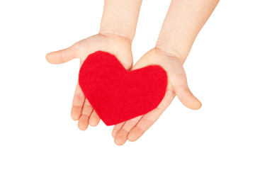 Obraz premium Children hands giving red heart.