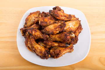 Mesquite Chicken Wings on White Plate and Wood Table
