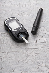 device for measuring blood sugar on table