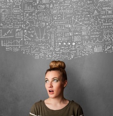 Young woman gesturing with sketched charts above her head