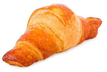 Gold-brown baked croissant in front of a white background
