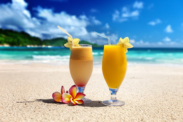 fresh fruit juices on a tropical beach