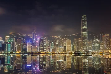 Tuinposter Hong Kong city skyline view from Kowloon © Noppasinw