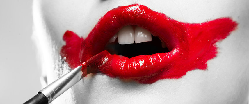 Conceptual Image with Vivid Red Mouth