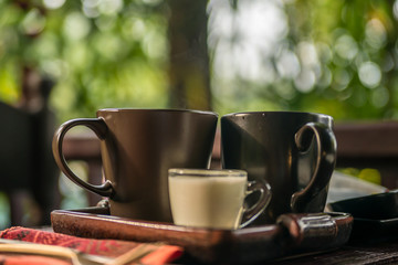 cup of tea with milk outfoors