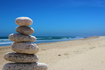 Fototapeta na wymiar zen balance stone on the beach 7