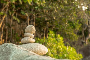 Fototapeta na wymiar Stones pyramid on stone symbol of harmony and balance.