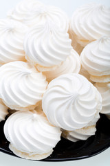 French vanilla meringue cookies on white background