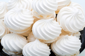 French vanilla meringue cookies on white background