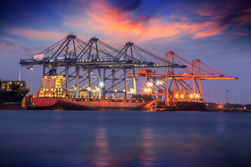 Fototapeta na wymiar Container Cargo freight ship with working crane