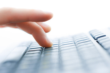Close-up of typing female hands on keyboard