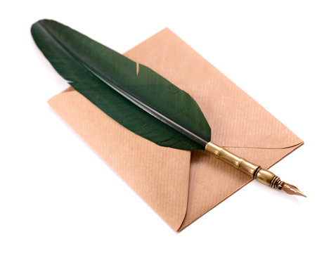 Envelope and quill pen isolated