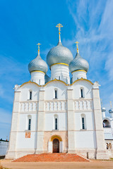Fototapeta na wymiar beautiful white stone Orthodox Cathedral with gray domes