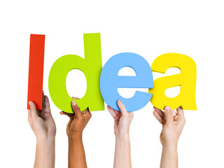 Multi-Ethnic Group Of People Holding The Word Idea
