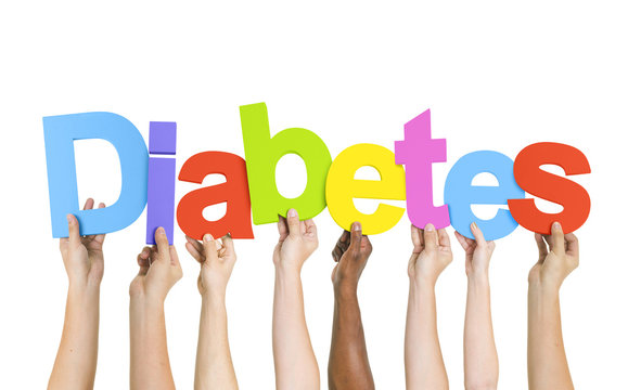 Multiethnic Group of Diverse People Holding Word Diabetes
