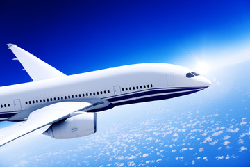 Fototapeta na wymiar Airplane with Blue Sky