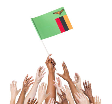 Diverse People Holding The Flag of Zambia