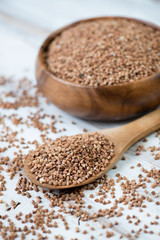 Raw buckwheat, close-up, vertical shot