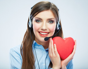 Woman call center operator hold love symbol Red heart. Close up
