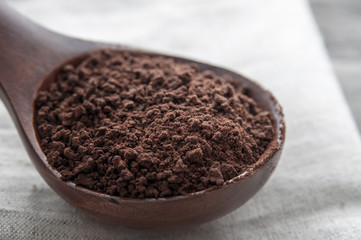 Instant coffee in wooden  spoon