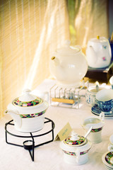 Retro tea set with bamboo background.