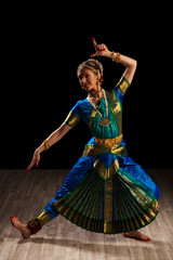 Beautiful girl dancer of Indian classical dance Bharatanatyam