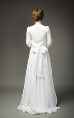 Fototapeta na wymiar White bride dress back side