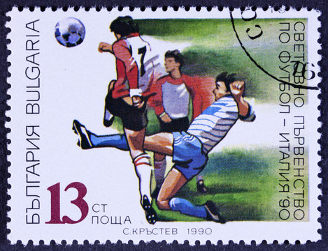 A stamp printed in Bulgaria shows football, circa 1990 
