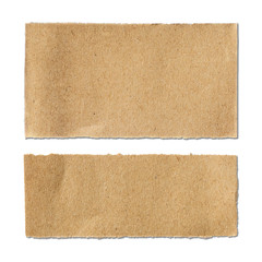 Torn brown paper sheet on white background