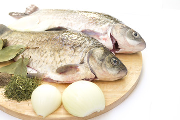 Raw fish crucian with spices