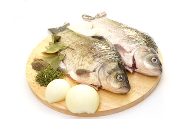 Raw fish crucian with spices