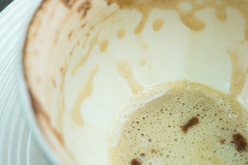 White cup of coffee foam finish