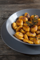 pumpkin dumplings italian gnocchi with thyme on plate