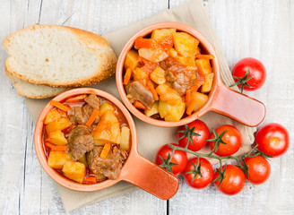 Stewed potatoes with meat