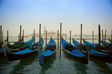Fototapeta na wymiar Venice with gondolas on Grand Canal against San Giorgio