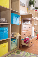 Fototapeta na wymiar Kinderzimmer mit Plüschtier und Babysachen