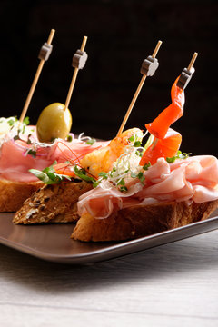 Tapas on Crusty Bread - Selection of Spanish tapas served