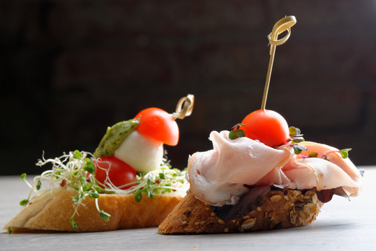 Tapas on Crusty Bread - Selection of Spanish tapas served