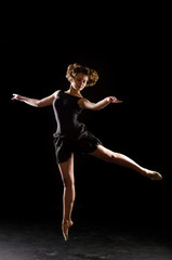 Ballerina on black background
