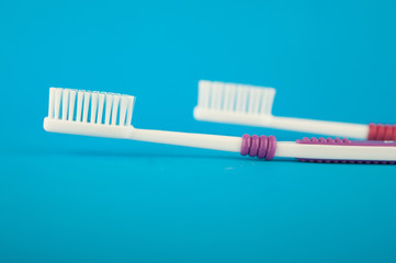 Closed up toothbrush on blue background